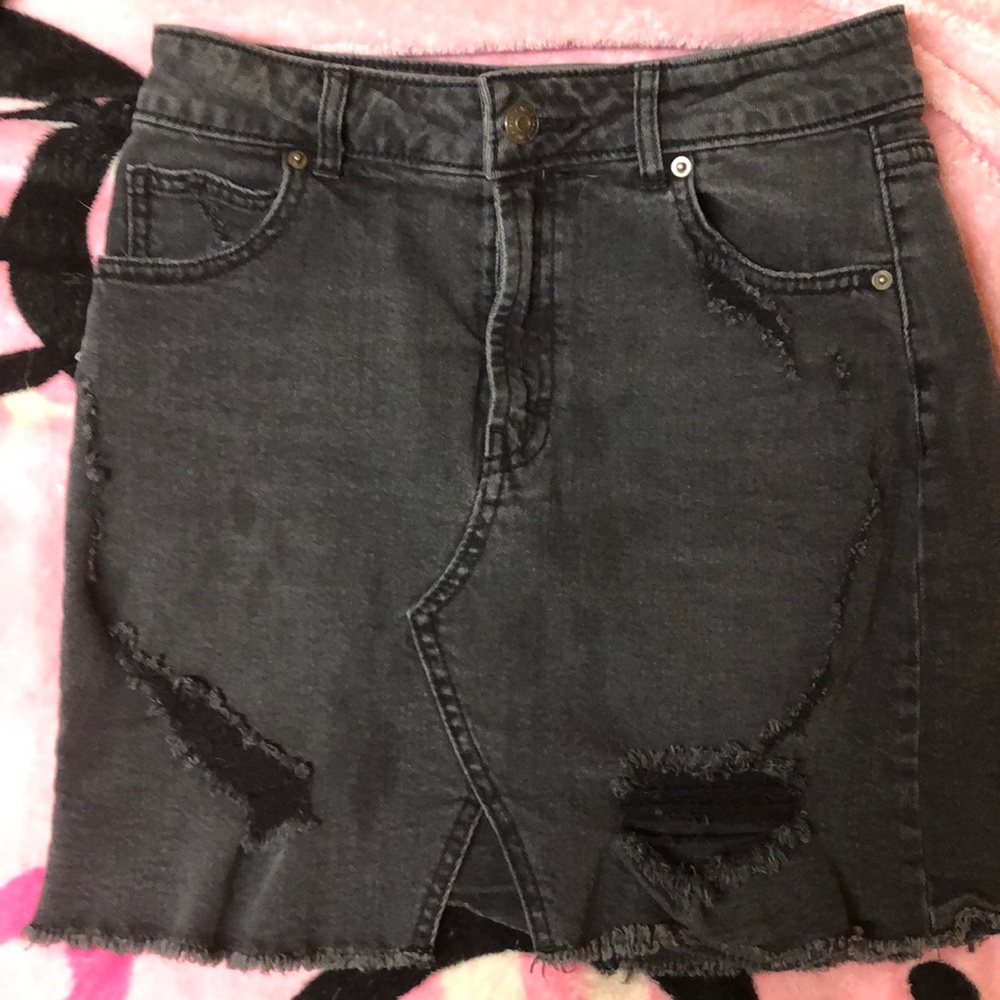 Short black skirt with slight distress and slit !